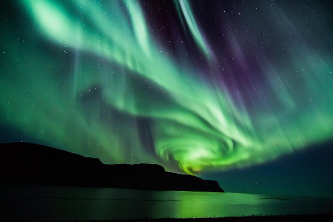 #1 Northern Lights Tour In Iceland from Reykjavik with PRO photos - The Main Stop: Leaving Reykjavik for Dark Skies and Better Odds