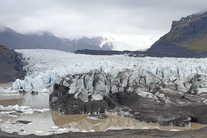 2-Day Highlights of Iceland | Land of Ice & Fire-Small Group Tour - Day 1 on the South Coast: waterfalls, cave views, glacier time
