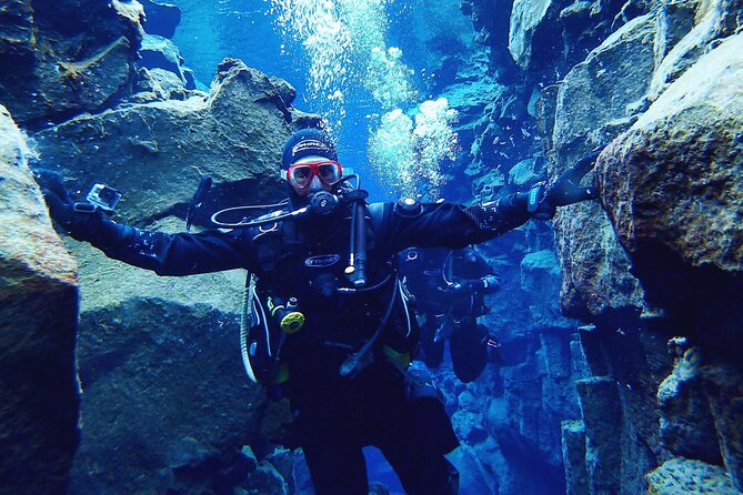 Dive the Divide: Silfra Fissure Scuba Tour | Meet at Thingvellir - The entry process: weights, ladder down, and that first waist-deep moment