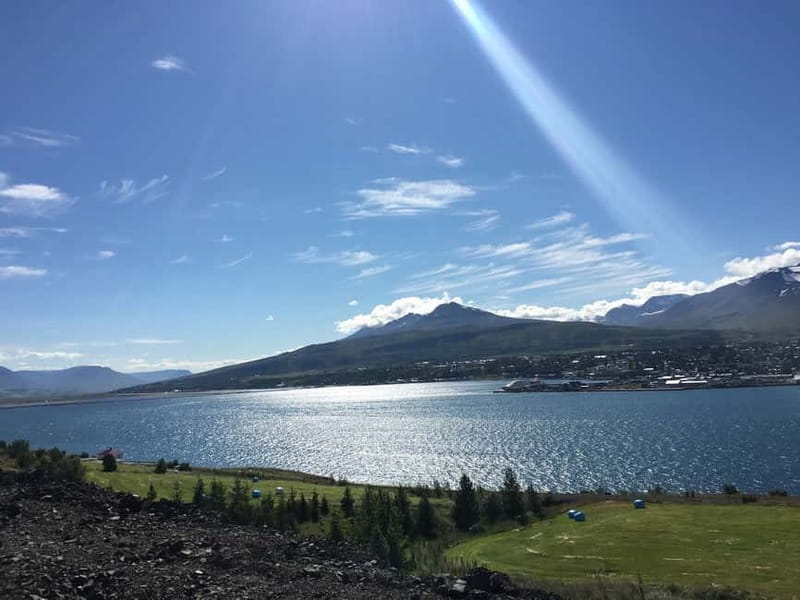 From Akureyri Port: Diamond Circle Guided Day Trip w/ Lunch - Húsavík break and the church stop that adds human scale