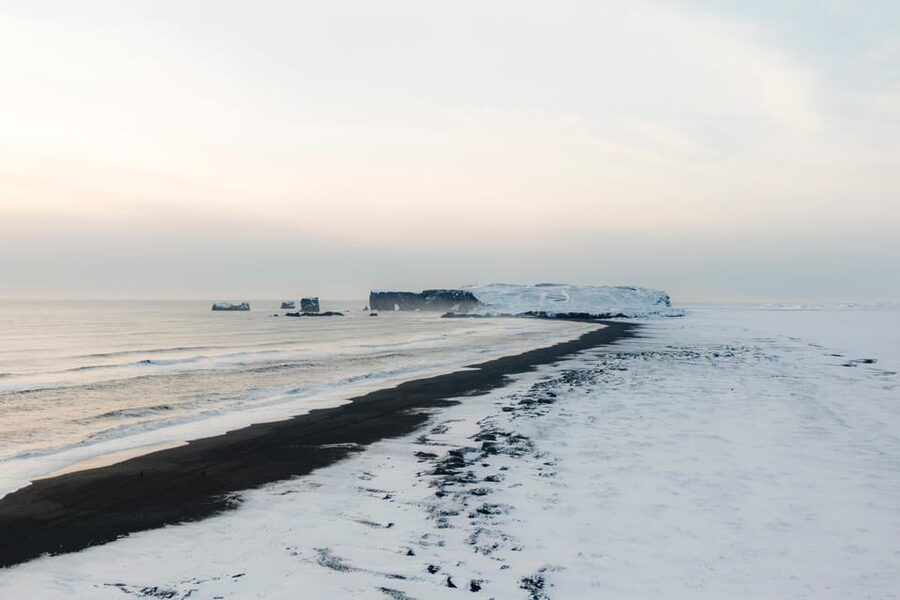 From Reykjavík: 2-Day South Coast Adventure - Reynisfjara black sand beach, Dyrhólaey, and basalt columns