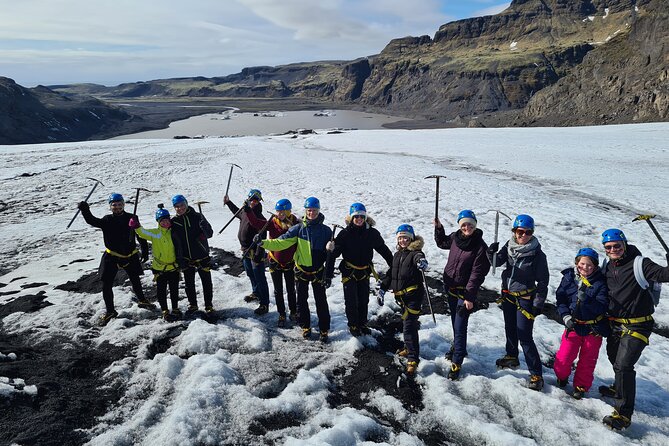 From Reykjavik: Glacier Hike, South Coast and Waterfalls Day Trip - Skógafoss, where the 60 m drop and the stairs set the tone