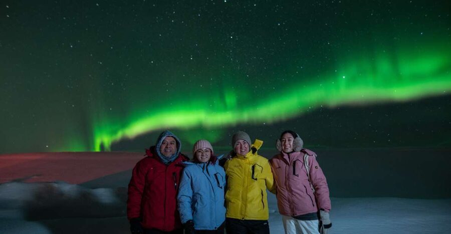 From Reykjavik: Northern Lights Guided Tour with Photos - The aurora hunt plan: short drives, changing locations, and waiting games