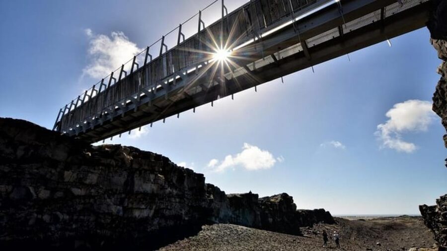 From Reykjavik: Reykjanes Geopark Tour & Airport Transfer - Reykjanesviti lighthouse and coastal bird cliffs