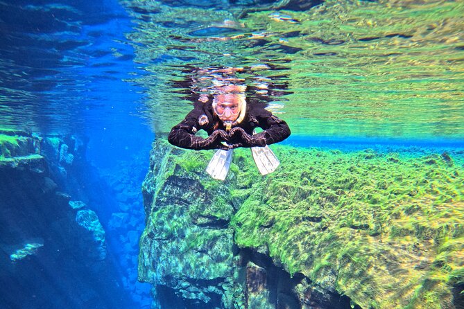 From Reykjavik- Silfra Snorkeling transfer included - What you do in the water: float, look, and follow instructions