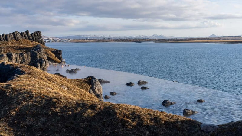 From Reykjavik: South Coast & Sky Lagoon Small-Group Tour - Sólheimajökull glacier: up close to ice and meltwater