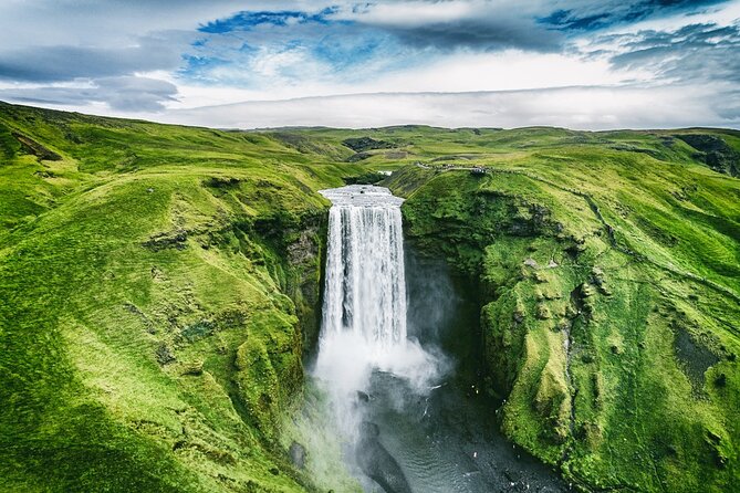Full Day Private Bespoke South Coast Tour - Skógafoss: stairs to the top and a panoramic payoff