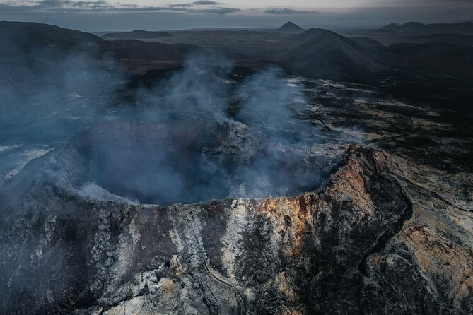 Full-Day Private Tour with Photography Secret Spots of Iceland - Stop 2, Brimketill natural pool shaped by waves