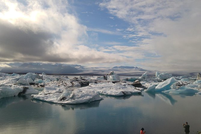 Glacier Lagoon, Diamond Beach, Black Sand Beaches and Waterfalls - Dyrhólaey and the Vík Viewpoint: Sea Cliffs and Coastal Drama