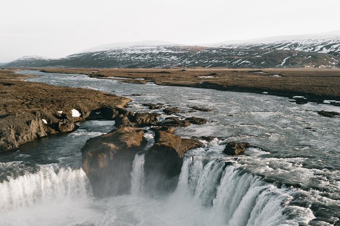 Godafoss Waterfall & Turf House Half-Day Tour from Akureyri Port - Stop 2: The human story around the waterfall