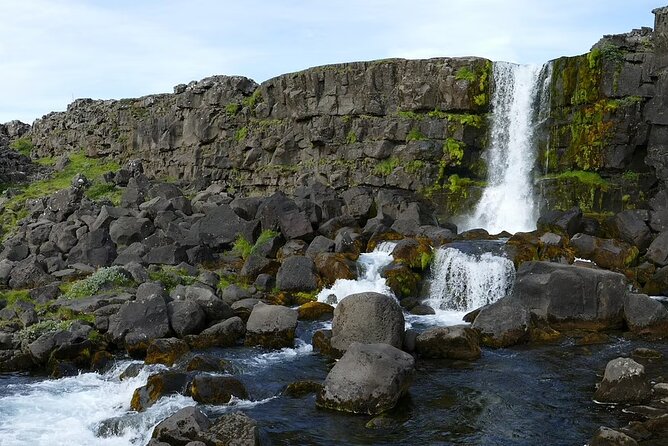 Golden Circle and Sky Lagoon Full-Day Tour - Kerið crater: red volcanic rocks and cyan water contrast