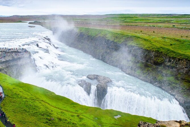 Iceland Golden Circle & Glacier Snowmobiling Guided Experience - Geysir: stroking a boiling-hot spot that keeps putting on a show