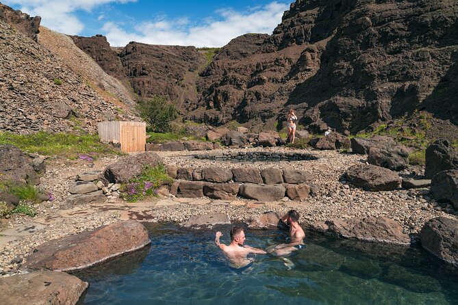 Lava Waterfalls, Sagas & Unique Canyon Baths - Small Group Tour - Husafell: Turf Houses, Elf-Style Huts, and the Lifting Stone