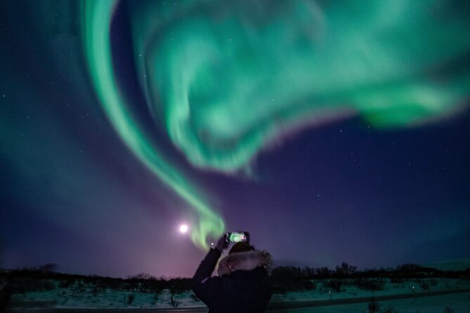 Northern Lights Small-Group Tour with Hot Chocolate & Photos - Weather, No Guarantees, and the Rebooking Reality