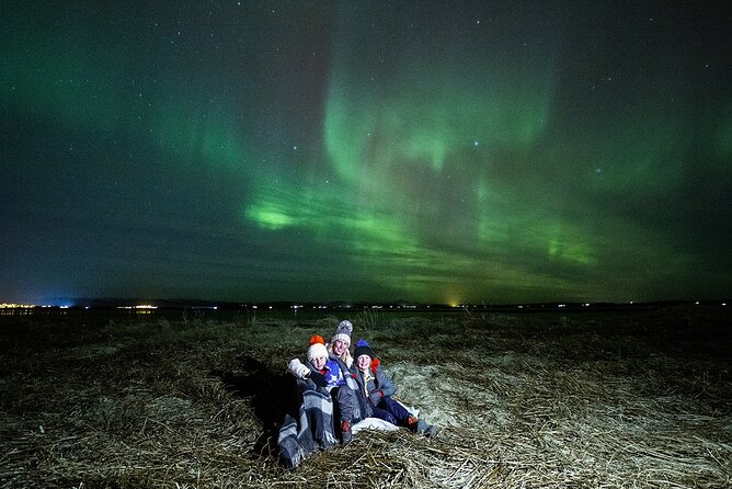 Northern Lights Small Group Tour with Photos - Hot chocolate, cinnamon buns, and why comfort boosts your odds