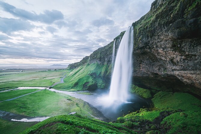 Private South Coast & Katla Ice Cave Tour in Iceland - Skogafoss: a spectacular cascade plus a climb for bigger views