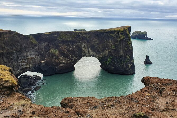 Private South Coast Tour: A Journey to Iceland’s Stunning Shore - Passing Eyjafjallajökull and reaching the glacier edge at Sólheimajökull