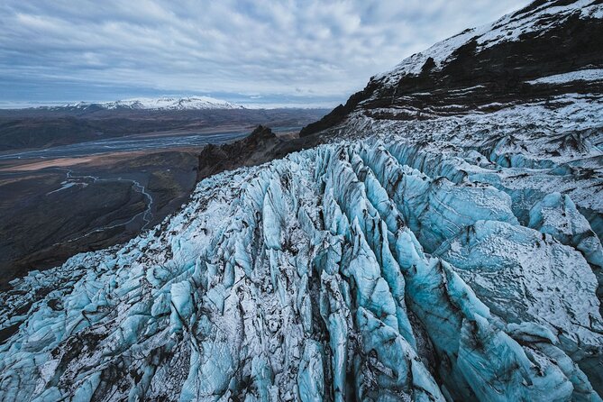 Private South Coast with Glacier Hike in Iceland - Dyrhólaey: Coastal Views and a Chance to Read the Weather