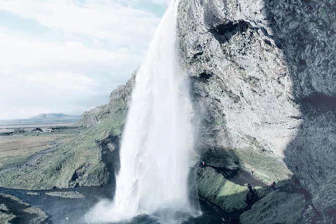 Reykjavik: Glacier Lagoon Boat Ride & South Coast Full Day Tour - Diamond Beach: black sand, ice sparkle, and timing pressure