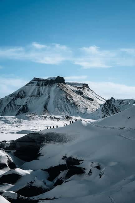 Reykjavik: Katla Ice Cave & South Coast Waterfalls Tour - Skógafoss: Big Water, Clean Photo Opportunities