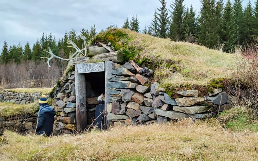 Reykjavik: Lava Cave, Hot Springs, and Waterfalls Tour - Húsafell break, shopping time, and getting back to Reykjavik