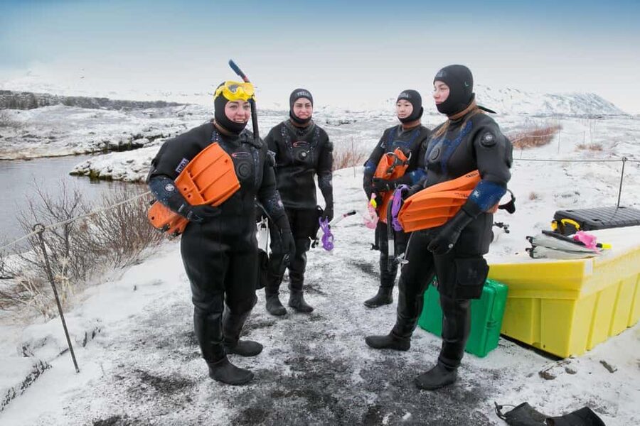 Reykjavík: Silfra Fissure Snorkeling and Lava Caving Tour - Guides, Group Sizes, and the Free Underwater Photo Setup