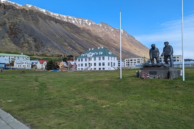 Self-Guided Tour of Ísafjörður: Art, History, and Architecture - Ísafjarðarkirkja: A Church with Sun and Pancake Lore