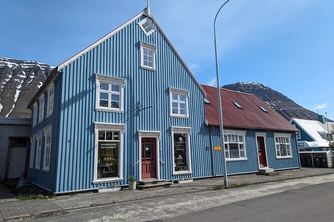 Self-Guided Tour of Ísafjörður: Art, History, and Architecture - Fishermen’s Monument and the 3D Crosswalk: Bronze + Playful Street Art