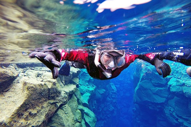 Silfra Drysuit Snorkeling Tour with Free Photos - From Reykjavik - Stop 2 in Silfra: swimming between plates in 100m visibility