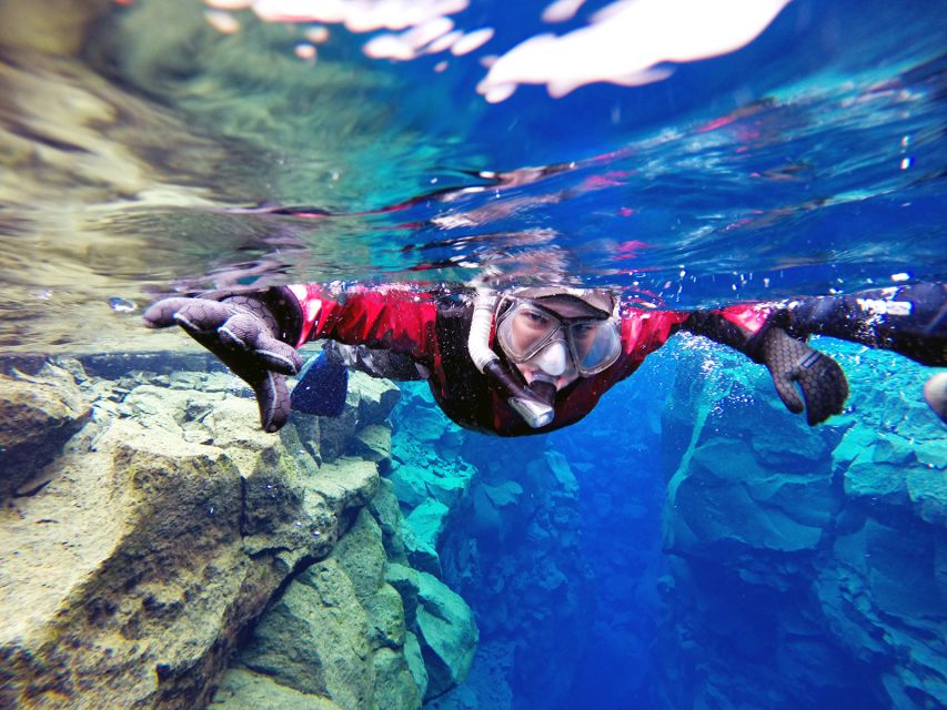 Silfra: Half-Day Snorkeling Day Trip with Underwater Photos - Getting suited up: drysuit snorkeling that feels technical, not scary
