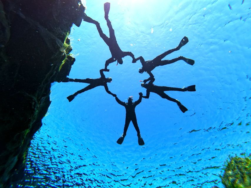 Silfra: Leidarendi Lava Caving & Snorkeling Tour with Photos - Snorkeling Silfra, 60 to 63 meters down, but you stay at the surface