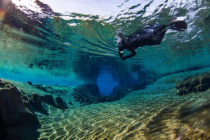 Silfra: Snorkeling Between Tectonic Plates Pick Up from Reykjavik - Silfra Hall, Cathedral, and Lagoon: What the Swim Feels Like