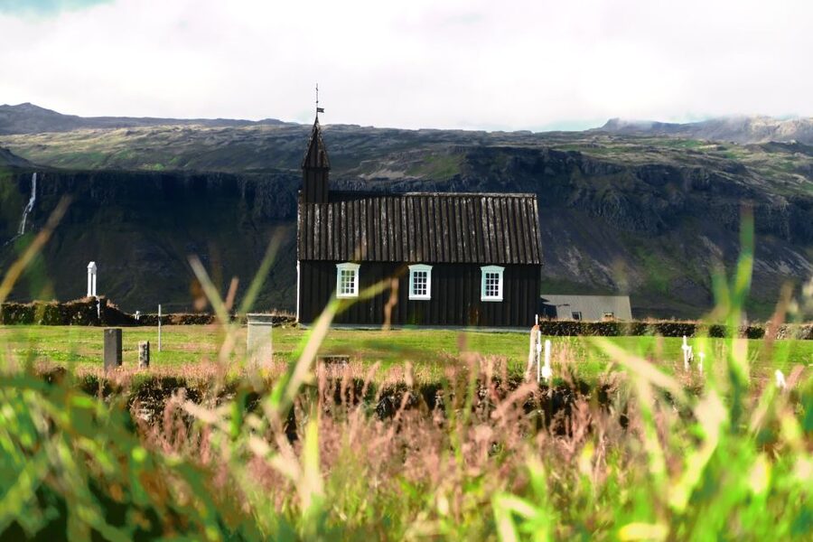 Snæfellsnes: Small-Group Hidden Treasures of The West Tour - Arnarstapi coastline, cliffs, stone arches, and Bárður the story-troll