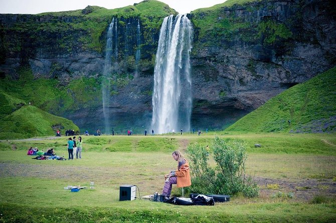 South Coast - Private - Stop 2: Skogafoss Wide Falls and Rainbows When the Sun Shows Up