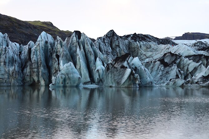 South Coast Tour & Glacier Hike | Private Super Jeep Tour - Reynisfjara black beach: basalt columns, sea stacks, and wave caution