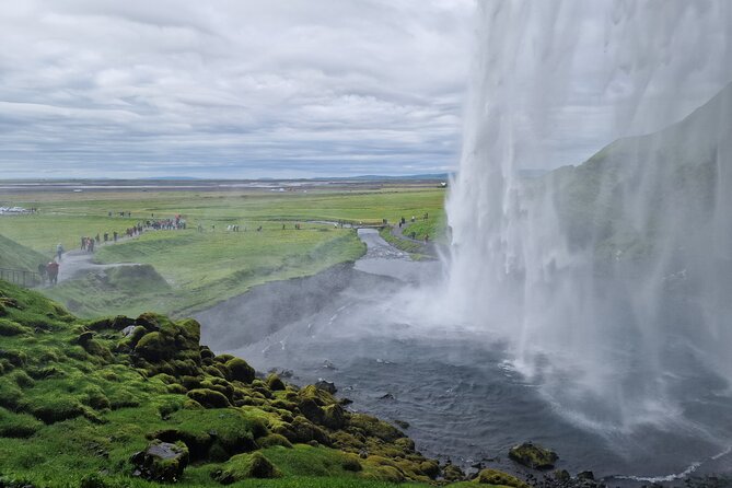 South Iceland, Glacier and Black Sand Beach Small Group Tour - Skógafoss stairs and the view over Eyjafjallajökull