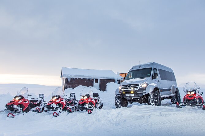 Super Jeep Golden Circle & Snowmobile on Glacier from Reykjavik - Gullfoss in winter: the crevice, the height, and the brownish water